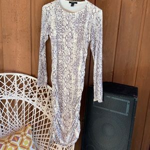 Snake print body con dress